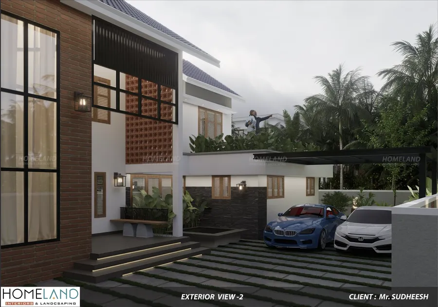 Evening perspective of Kerala home with outdoor patio lighting and manicured greenery